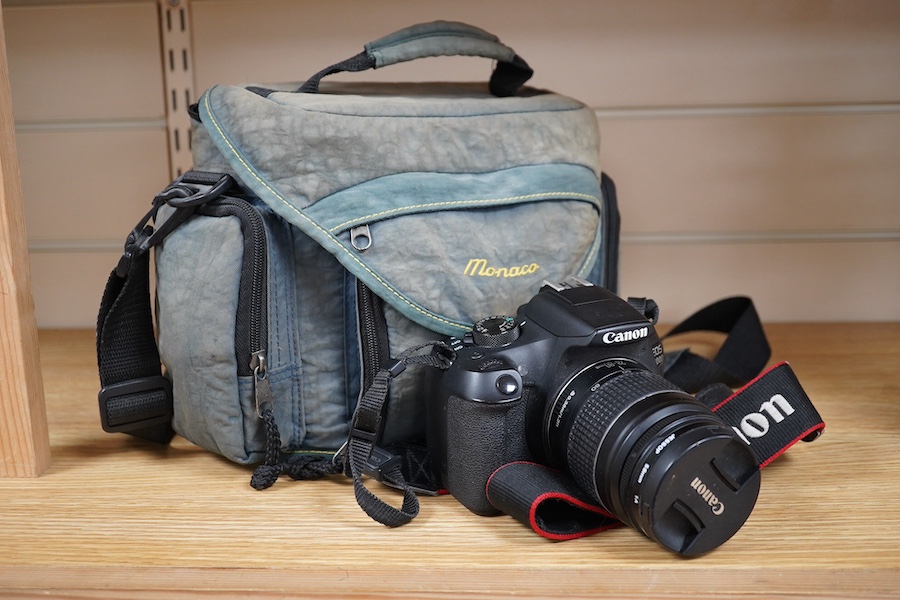 1 x Canon EOS 1300D Digital camera, fitted 28/80mm Canon lens, including Canon neck strap. battery and charger. Condition - bag worn, not tested